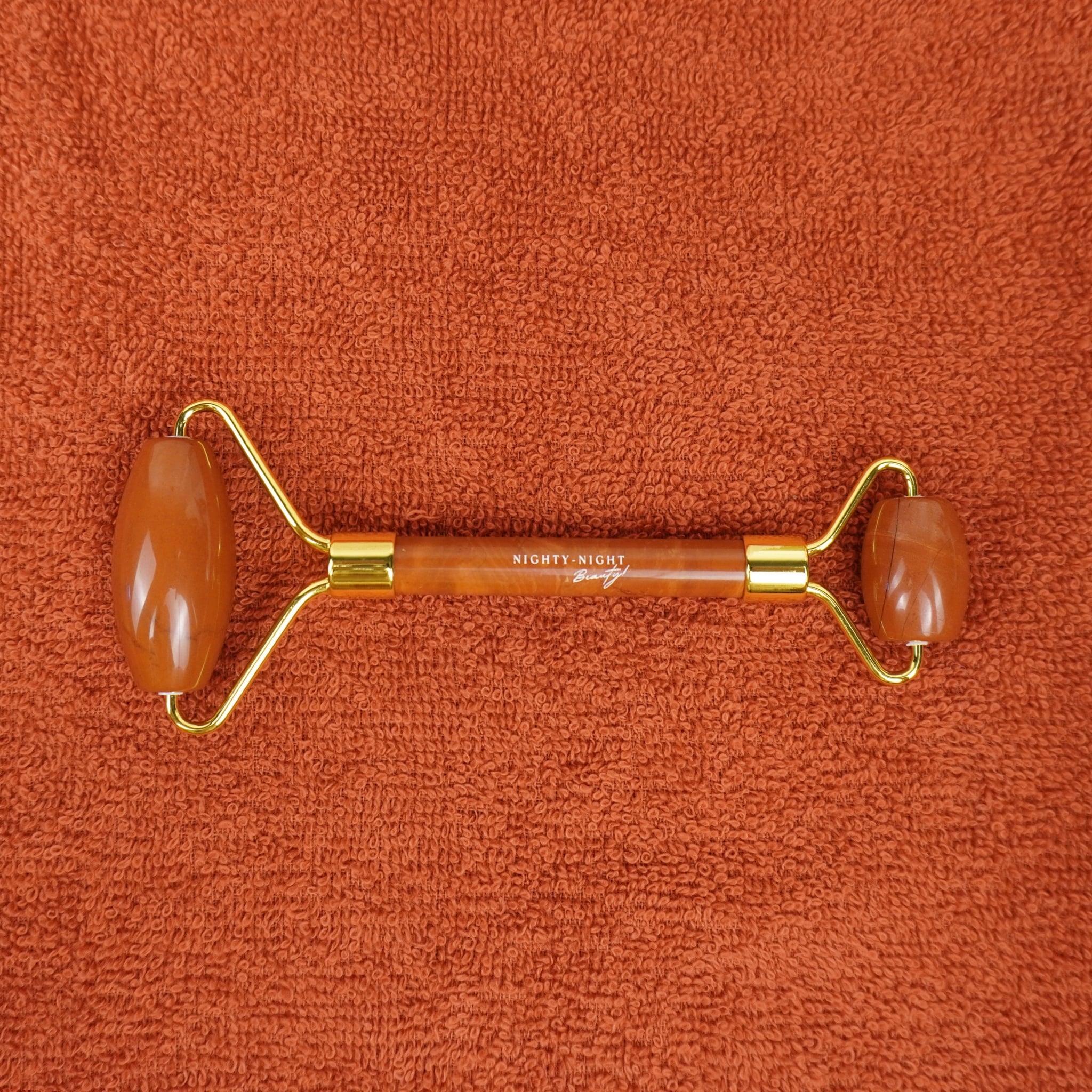 high-quality-red-stone-face-massager-roller-Nighty-Night-Beauty