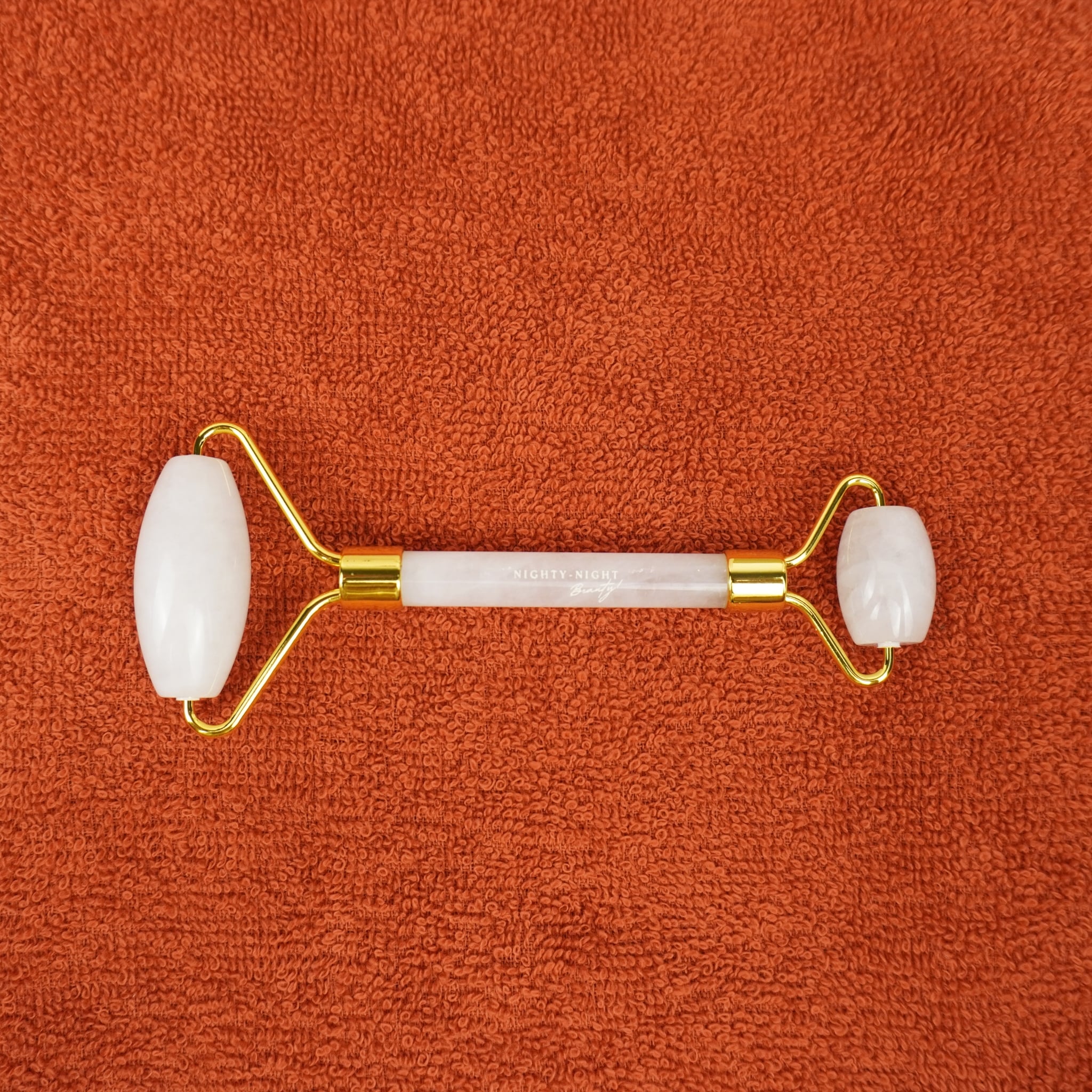 high-quality-white-quartz-face-massager-roller-Nighty-Night-Beauty
